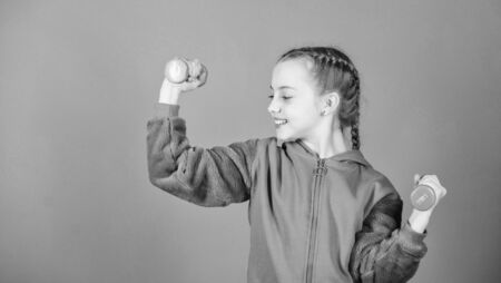 workout of small girl hold dumbbell. Fitness diet for energy health. weight lifting for muscule....