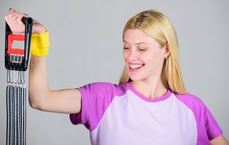 Enjoy result. How use equipment proper way. Exercising with expander equipment. Sport equipment...