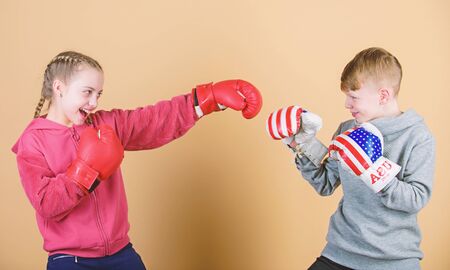 workout of small girl and boy boxer in sportswear. Happy children in boxing gloves. Fitness diet....