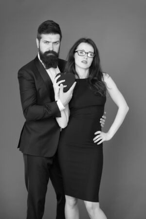 love date and romance. tuxedo man and elegant woman at formal party. couple in love. valentines day heart. bearded businessman with lady. formal couple. business meeting. Real love. i love youの写真素材