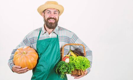 Joyful mood. bearded mature farmer. seasonal vitamin food. Useful fruit and vegetable. organic and natural food. happy halloween. man chef with rich autumn crop. harvest festivalの写真素材