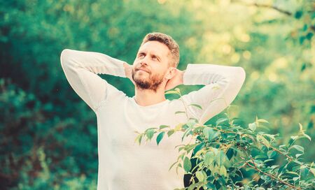 enjoying green life. man in forest. time to think. ecological life for man. man in green forest. morning in nature. healthy lifestyle. nature and health. mature fashion model. macho man. inspirationの写真素材