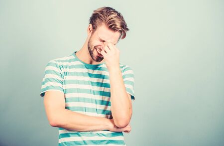 Have some doubts. Thoughtful expression. Need to think. Find solution. Hipster bearded face not sure in something. Thoughtful man on blue background. Hard question. Man serious face thoughtfulの写真素材