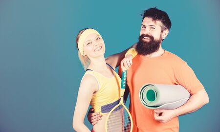 Man and woman couple in love with yoga mat and sport equipment. Fitness exercises. Workout and fitness. Girl and guy live healthy life. Fitness exercises. Sport is our life. Healthy lifestyle conceptの写真素材