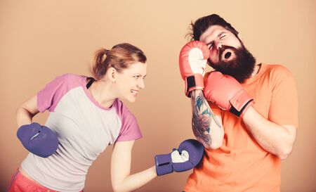 Couple girl and hipster practicing boxing. Sport for everyone. Amateur boxing club. Equal...