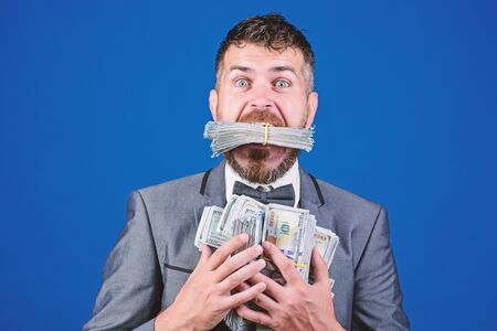 happy bearded man has a lot of money. Business and sport success. winning a lottery. businessman after great deal. Finance and commerce. Billioner with dollar banknotes. Pocketing company moneyの写真素材