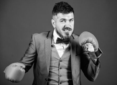 Business and sport success. businessman in formal suit and tie. powerful man boxer ready for...