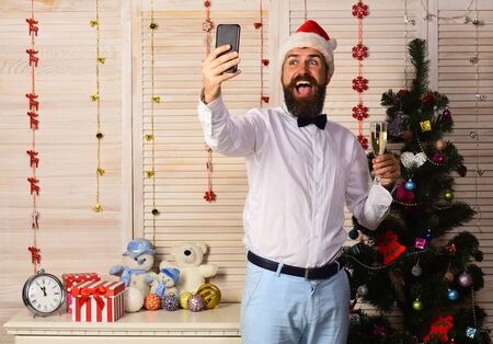 Celebration and New Year greeting concept. Man with beardの写真素材