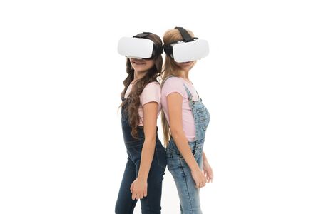 Taking advantage of this new technology. Adorable little kids using VR technology for learning and playing. Cute small children experiencing innovative technology. The technology is there, copy spaceの写真素材