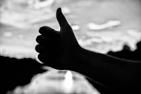 Thumbs up gesture sign of best choice approve and accept.の写真素材