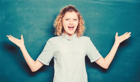 School stuff. knowledge day. empty blackboard information. back to school. woman likes studying. confused student at blackboard. university or college life. woman teacher at school lessonの写真素材