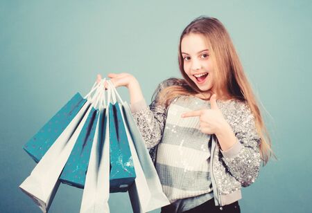 mega sale. Small girl with shopping bags. special offer. Holiday purchase saving. Kid fashion. shop...