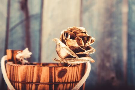 golden flower. flower shop decor. luxury and success. metallized decoration. antique concept. wealth and richness. floristics business. Vintage and jewelry. natural beauty. Gold rose. antique artの写真素材