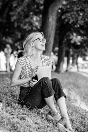 Education. summer online. Blogger create content for social network. woman has business online. Web communication. Blogger becoming inspired by nature. writer with notebook. girl with laptopの写真素材