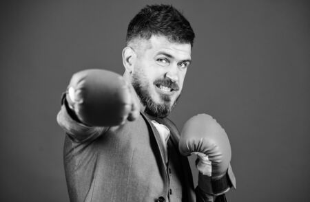 Attack and defense concept. Successful businessman. Criminal defense lawyer planning out strategies. Businessman wear boxing gloves. Best criminal defense lawyer strategies. Tactics proven to workの写真素材