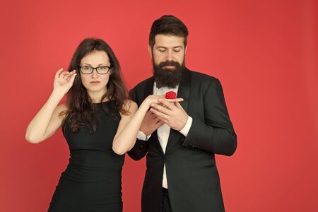 yes i do. valentines day. sexy couple in love. tuxedo man and elegant woman at engagement party....