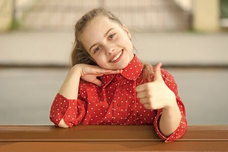 Summer holidays. Happy day. Smile my best accessory. Girl carefree child. Smile suits her. International childrens day. Laughing all day. Happiness joy and fun concept. Kid long hair happy smile faceの写真素材