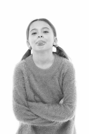 Just for fun. Girl cute child making funny grimace with tongue. Carefree mood. Happy childhood. International childrens day. Little happy girl having fun. Enjoying happy life. Joy an fun conceptの写真素材