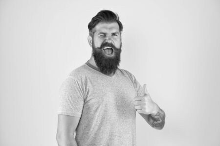 Just perfect. Man bearded hipster with mustache. Beard mustache grooming guide. Hipster handsome bearded guy yellow background. Barber shop concept. Growing and maintaining moustache. Grow mustacheの写真素材