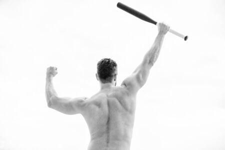 muscular back man isolated on white. man with baseball bat. i am a criminal. Hooligan man hits the bat. Bandit gang and conflict. full of energy. sport activity and game.の写真素材