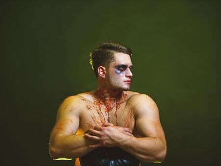 Macho with torso looks aside. Autumn season and seduction conceptの写真素材
