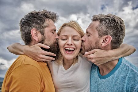 Everything you should know avoid friend zone start dating. Men kiss same girl in cheeks. She likes male attention. Girl hugs with two guys. Friendly relationships. Ultimate guide avoiding friend zoneの写真素材