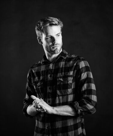 Standards of manliness or masculinity. Handsome well groomed man. Manliness concept. Meaning of modern manliness. Barbershop and beauty salon. Hipster black background. Exhibit masculine traitsの写真素材