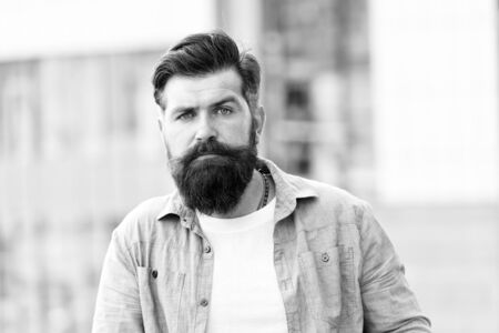 A hair salon for men. bearded man outdoor. Mature hipster with beard. Bearded man. Confident and handsome brutal man. Hair and beard care. Male barber care. brutal caucasian hipster with moustacheの写真素材
