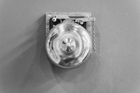 retro bronze gong. boxing gong. vintage gong alloy. old bell gong on wall. boxing bell. result alarm...