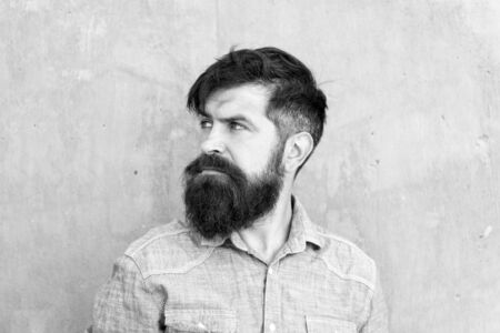 Brutality and beauty. Masculinity concept. Barber shop beard grooming. Feeling manly. Styling beard and moustache. Facial hair treatment. Hipster with beard brutal guy. Fashion trend beard groomingの写真素材