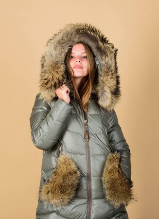 Shopping guide. Fashion boutique. Faux fur. Girl wear warm jacket. Shopping concept. Black friday. Personal stylist service. Buy winter clothes. Sale and discount. Woman shopping try winter clothesの写真素材