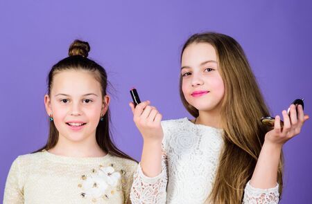 Creativity is best makeup skill. Make up school. Makeup art. Explore moms cosmetics bag concept. Salon and beauty treatment. Children little girls make up face. Makeup store. Experimenting with styleの写真素材