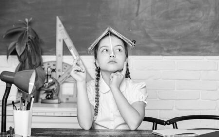 home schooling. small girl study with in school. Formal informal and nonformal education. back to school. digital age with modern technology. future success is studying. small child in classroomの写真素材