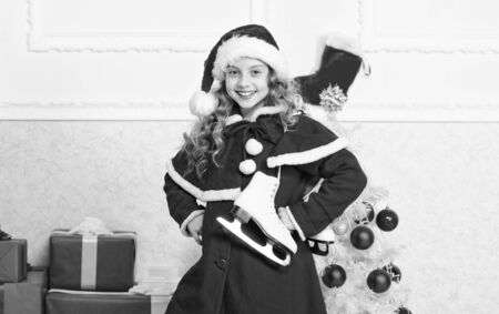 Top christmas celebration ideas. Winter holidays concept. Enjoy christmas holidays. Child red santa costume ready to celebrate. Merry christmas and happy new year. Christmas tradition holidayの写真素材