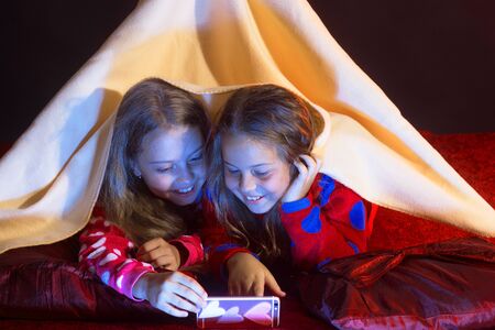 Childhood and happiness concept. Girls with smiling facesの写真素材