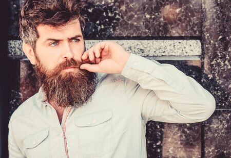 Bearded man outdoor. Beard care and barbershop. Mature hipster with beard. brutal male with perfect...