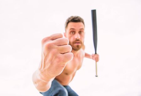 Ready to fight. see my fist. man with baseball bat. i am a criminal. Hooligan man hits the bat. Bandit gang and conflict. aggression and anger. unshaven muscular man fighting. full of energyの写真素材