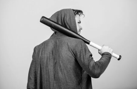 Taking a break. Hooligan macho hits the bat. sport activity. full of energy. Sport. Bandit gang and conflict. aggression and anger. man with baseball bat. Sexy muscular man fightingの写真素材