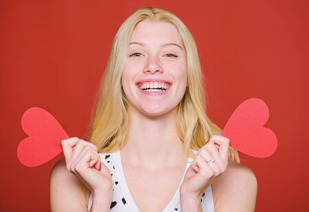 Love and romance. Valentines day discount. Valentines day shopping. Guess what he gifted to me. Celebrate valentines day. Girl romantic mood dream about date. Woman hold heart valentines decorationの写真素材