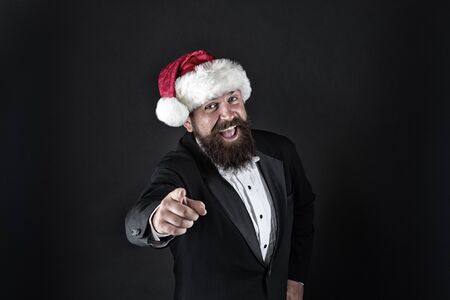 Bank worker. Man bearded hipster wear santa hat. Christmas spirit concept. Corporate holiday party ideas. Corporate christmas party. Insurance services. Manager celebrate new year. Christmas partyの写真素材