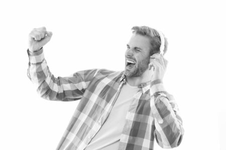 Positive vibes. Good mood. Man listening music wireless headphones. Hipster headphones gadget. Rhythm of life. Unshaved handsome guy enjoy music. Music fan concept. Music playlist for daily lifeの写真素材