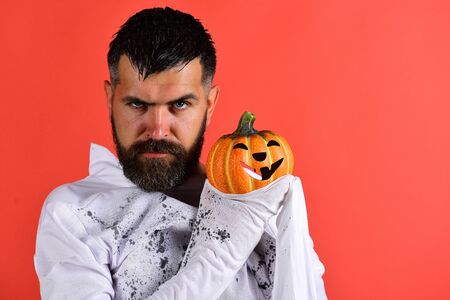 Halloween character in white long sleeved ghost costumeの写真素材