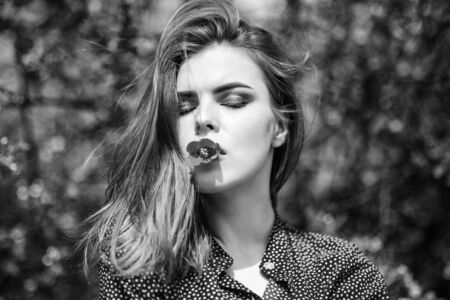 Summer fashion. natural beauty makeup. hair fashion. sexy woman in spring blossom. fashion beauty. summer blooming trees and flowers. pretty woman skincare. girl like natureの写真素材