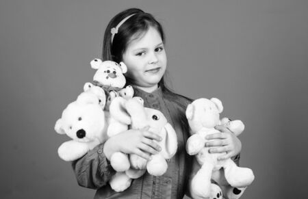 happy childhood. Birthday. child at home. toy shop. childrens day. Best friend. little girl playing in playroom. hugging teddy bear. toys for kid. small girl with soft bear toy. Always happy togetherの写真素材