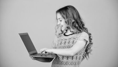 Surfing internet. Develop own blog. Personal blog. Social networks and blog. Information source. Modern life. Blogging concept. Girl with laptop computer. Little child using pc. Digital technologyの写真素材