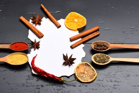 Set of dry spices on dark greyの写真素材