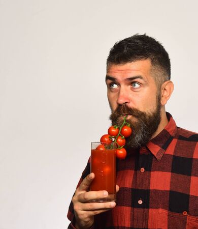 Guy holds homegrown harvest. Farming and gardening concept.の写真素材