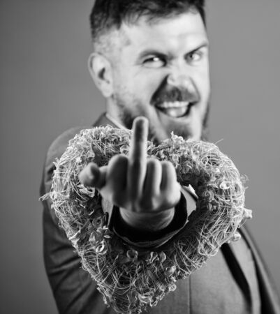 Hate you. Disappointed love valentines day. Romantic macho show middle finger gesture. Happy...