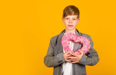 Be my Valentine. Valentine boy. Litle boy hold heart decor. Valentines day. Holiday celebration. My all love for my Valentine. Valnetine concept, copy spaceの写真素材