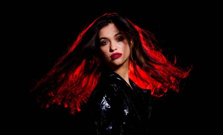 Making your hair look shiny. Sensual woman with long brunette hair. Haidressing and styling. Beauty...